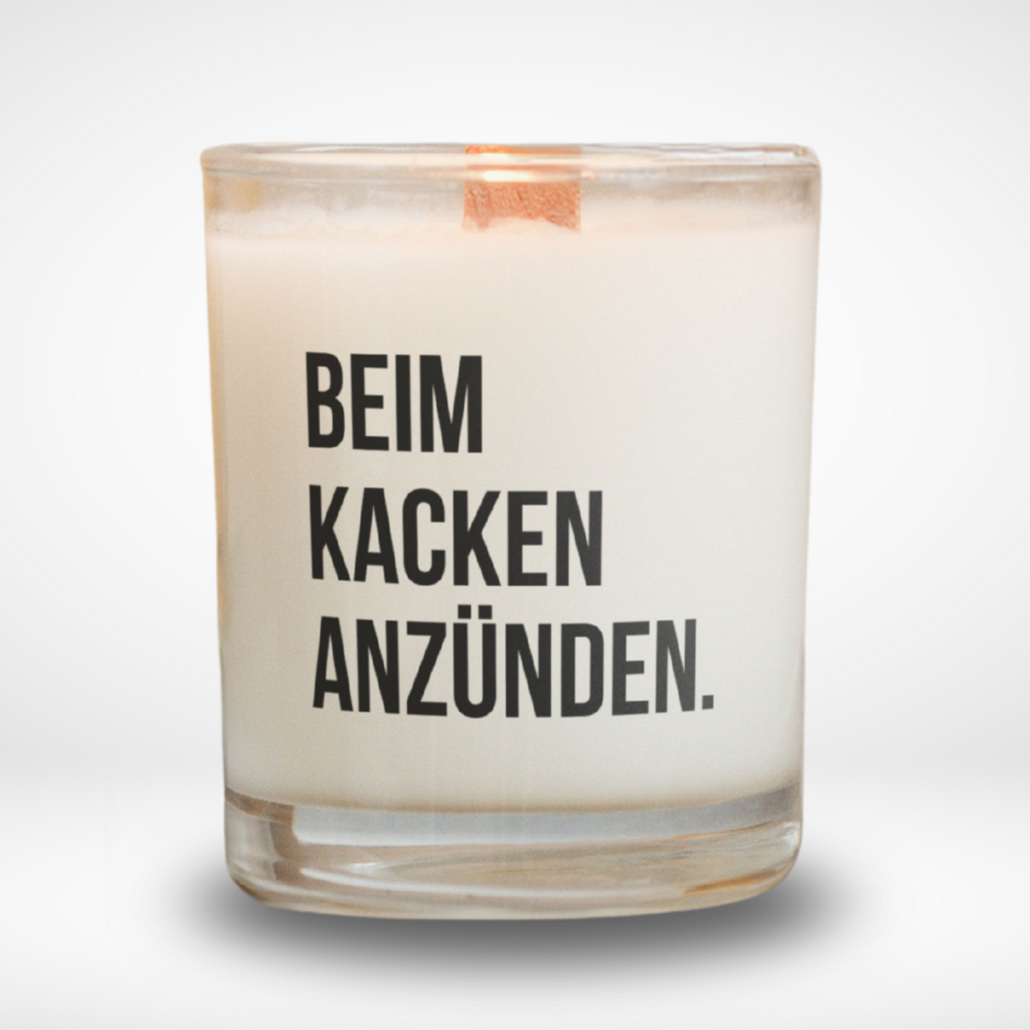 Spruchkerze „Beim kacken anzünden."