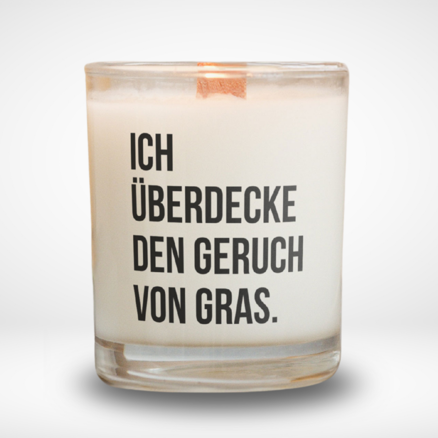 Spruchkerze „Ich überdecke den Geruch von Gras."