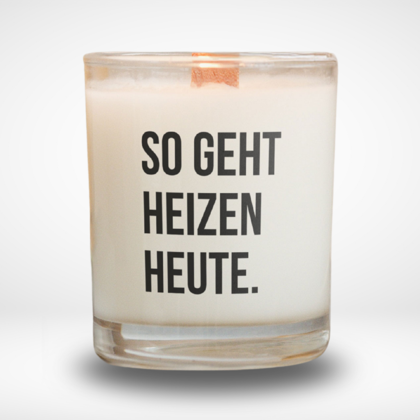 Spruchkerze „So geht Heizen heute."
